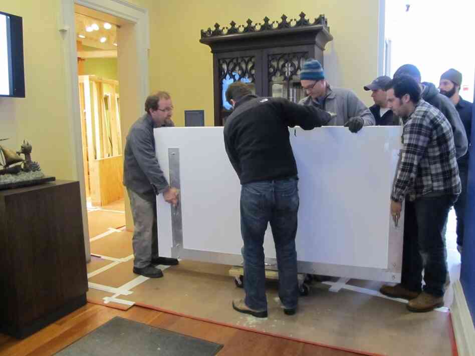A team of eight art handlers and  conservators transported The Chertoff Mural from the truck into the Rosenbach Museum & Library's Maurice Sendak  Gallery.