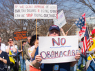 Supporters of the Tea Party movement protest health care overhaul outside the U.S. Capitol March 20, 2010. Supporters of the Tea Party movement protest health care overhaul outside the U.S. Capitol March 20, 2010.
