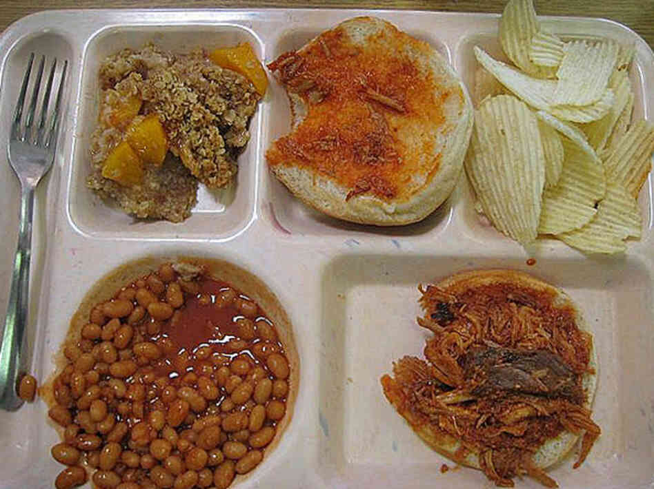Cashion, Oklahoma, 2008. Peach crisp desert, chips, bbq beef sandwich and baked beans.  
