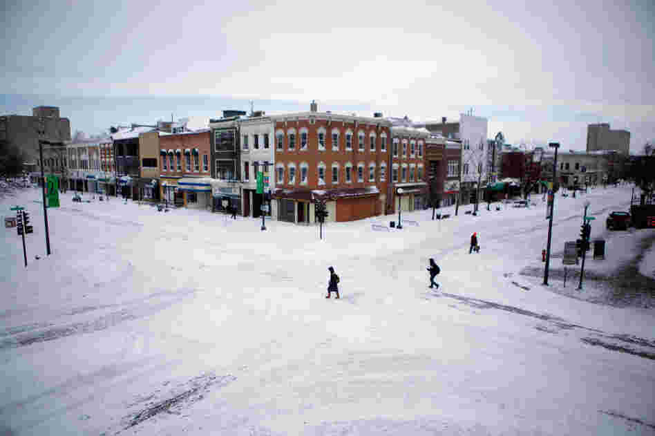 The downtown area near the University of Iowa is a virtual ghost town after the storm moved through the Midwest on Wednesday in Iowa City, Iowa. 