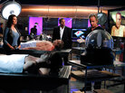 Television shows like CSI provide an unrealistic view of the technology available to death investigators. In this photo from a recent episode of CSI:NY, characters Det. Josephine "Jo" Danville (Sela Ward) confers with Dr. Sheldon Hawkes (Hill Harper) and Dr. Sid Hammerback (Robert Joy) in their lab. Television shows like CSI provide an unrealistic view of the technology available to death investigators. In this photo from a recent episode of CSI:NY, characters Det. Josephine "Jo" Danville (Sela Ward) confers with Dr. Sheldon Hawkes (Hill Harper) and Dr. Sid Hammerback (Robert Joy) in their lab.