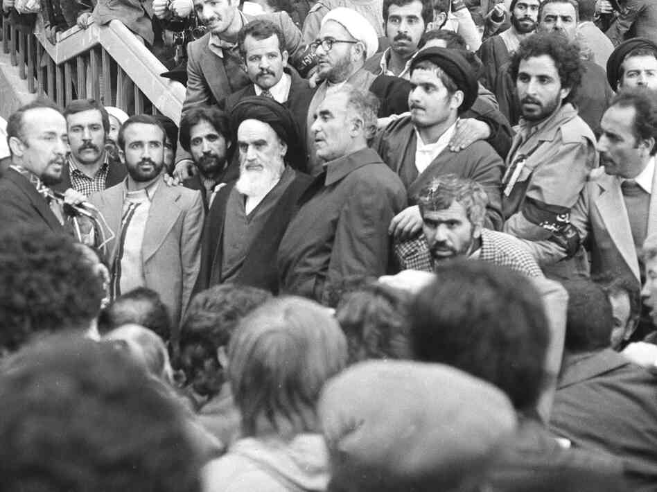 Ayatollah Ruhollah Khomeini is surrounded by followers after his arrival at Mehrabad Airport on Feb. 1, 1979, after 14 years of exile. Ayatollah Ruhollah Khomeini is surrounded by followers after his arrival at Mehrabad Airport on Feb. 1, 1979, after 14 years of exile.