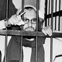Ayman al-Zawahiri stands behind bars in an  Egyptian court in 1982 during his trial as one of the alleged masterminds of the assassination of Egyptian President Anwar Sadat.