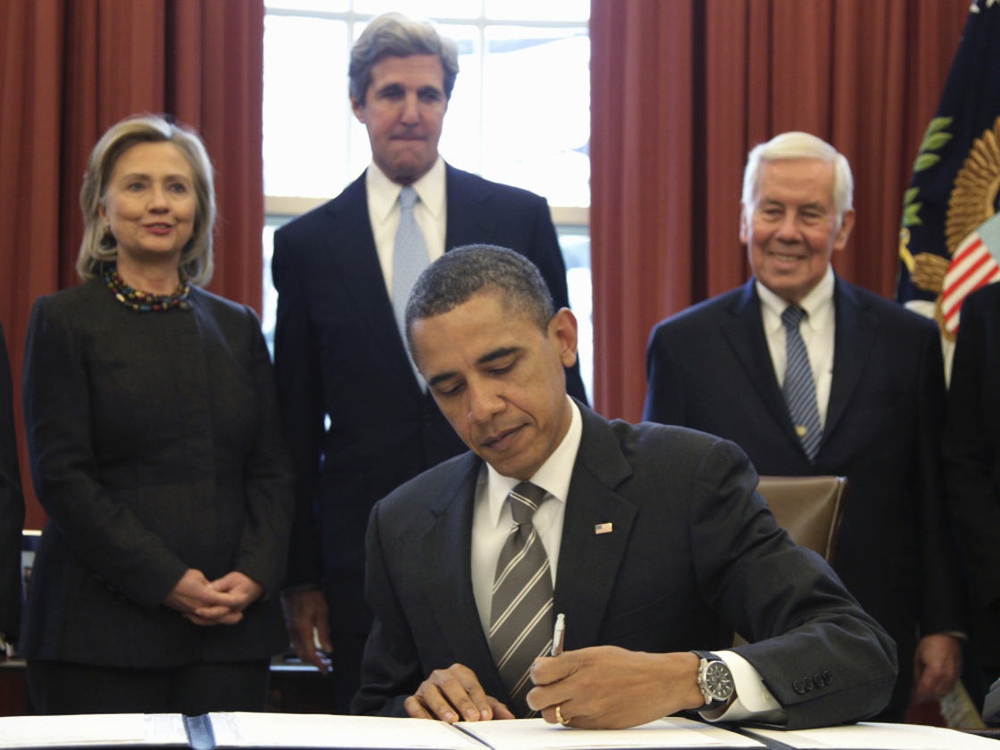 President Obama signs the New START Treaty, Wednesday, Feb. 2, 2011 as Secretary of State Hillary Rodham Clinton, Sen. John Kerry (D-MA) and Sen. Richard Lugar (R-IN) watch.
