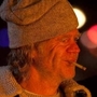 William H. Macy, as Frank Gallagher, stands at a bonfire with his family in Shameless. William H. Macy, as Frank Gallagher, stands at a bonfire with his family in Shameless.