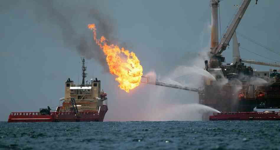 A drilling rig burned oil and gas captured from BP's blown-out well in July 2010. A drilling rig burned oil and gas captured from BP's blown-out well in July 2010.