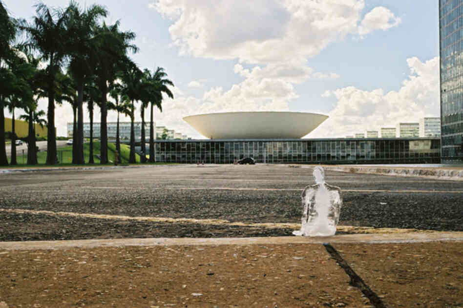 A lone ice figure melts outside of the National Congress in Brasilia, Brazil, in 2003. 