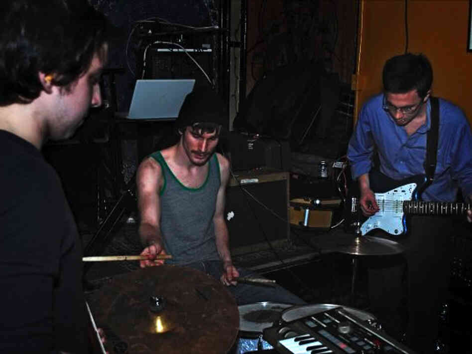 The hypnotic "Moon Deluxe" finds Andrew Cedermark (right) enshrouding his guitar and voice in swirling, murky reverb.