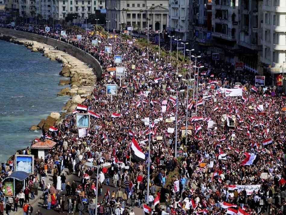 Tens of thousands of anti-government protesters marched in Alexandria, Egypt's second-largest city, on Friday.