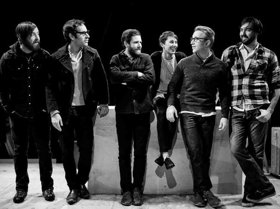 Campfire OK's "Strange Like We Are" grows as it goes,   with handclaps and three-part harmonies culminating in powerful   choruses.