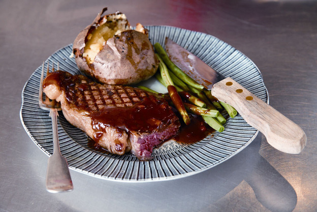 Nigella Lawson says her Date Steak recipe makes a regular steak "look like it's got a party dress on — but it's not wearing uncomfortable shoes." (Recipe below.)