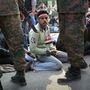 Egyptians stage a sit-in after the army ordered their encampments torn down in Tahrir Square on Sunday. Egyptians stage a sit-in after the army ordered their encampments torn down in Tahrir Square on Sunday.