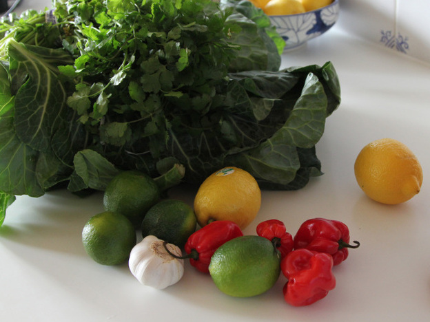 The greens are accompanied by a simple hot sauce of lemon and lime juice with chopped cilantro, garlic and chilies.