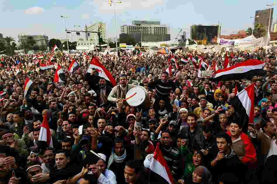 Egyptians celebrate Mubarak's resignation. 