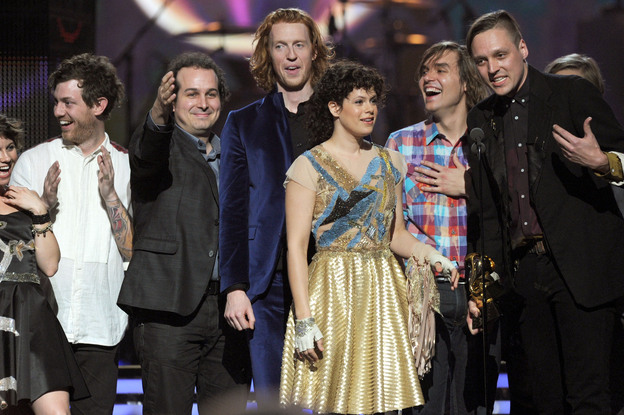 Arcade Fire accepts the Album of the Year Award for The Suburbs onstage during The 53rd Annual Grammy Awards.