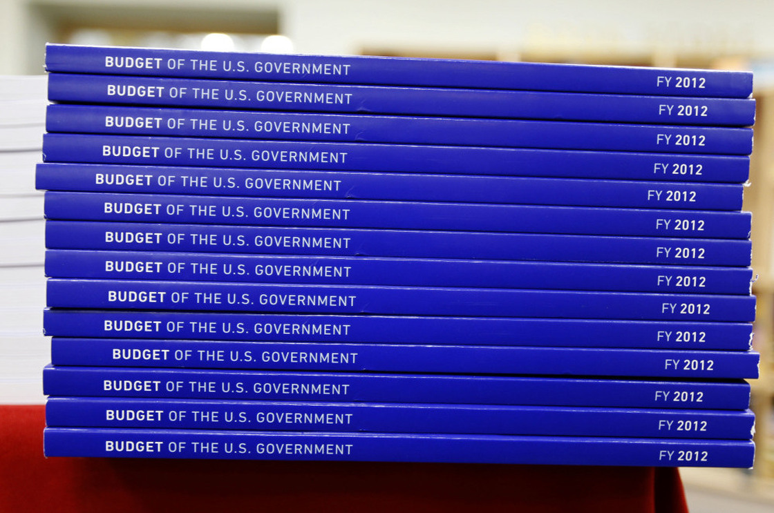 Copies of the U.S. government budget for Fiscal Year 2012 are stacked up at the U.S. Government Printing Office in Washington, Monday, Feb. 14, 2011.(AP Photo/Alex Brandon)