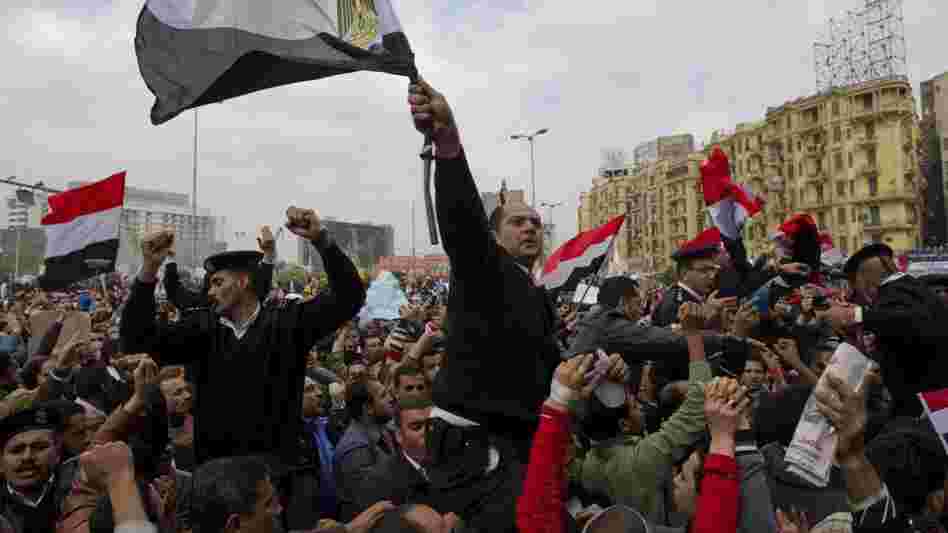 Egyptian policemen demonstrate at Cairo's Tahrir Square, the epicentre of the popular revolt that drove veteran strongman Hosni Mubarak from power.