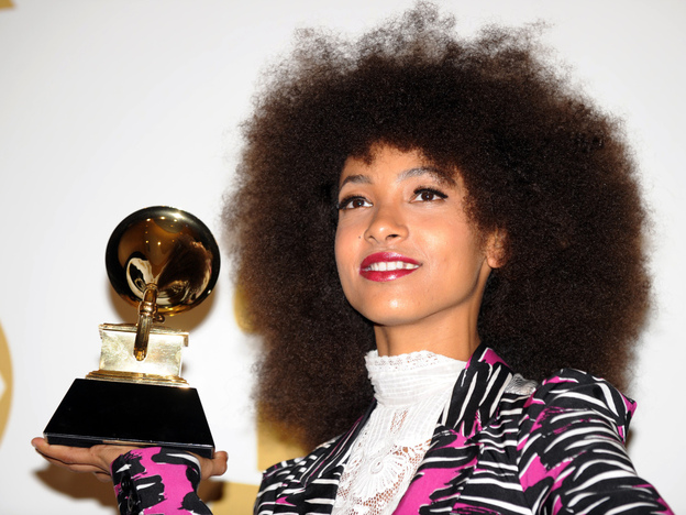 Esperanza Spalding poses with her Grammy Award.