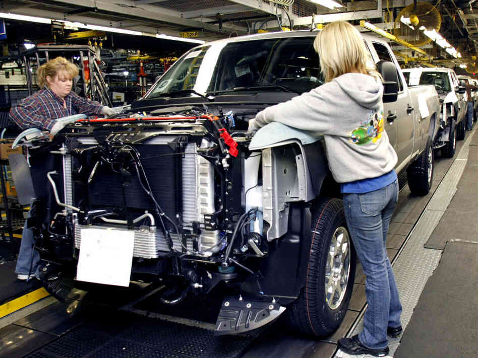 Workers on a Chevrolet pickup truck assembly line in Flint, Mich., on Jan. 24, 2011.