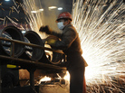 Sparks flew at a steel mill in Hefei, in eastern China's Anhui province, on Dec. 23, 2010. Sparks flew at a steel mill in Hefei, in eastern China's Anhui province, on Dec. 23, 2010.