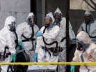 Hazardous materials experts enter the Hart Building of the U.S. Senate on Nov. 7, 2001, in Washington. The building was closed after an anthrax-laced letter was found in then-Sen. Tom Daschle's office. Hazardous materials experts enter the Hart Building of the U.S. Senate on Nov. 7, 2001, in Washington. The building was closed after an anthrax-laced letter was found in then-Sen. Tom Daschle's office.