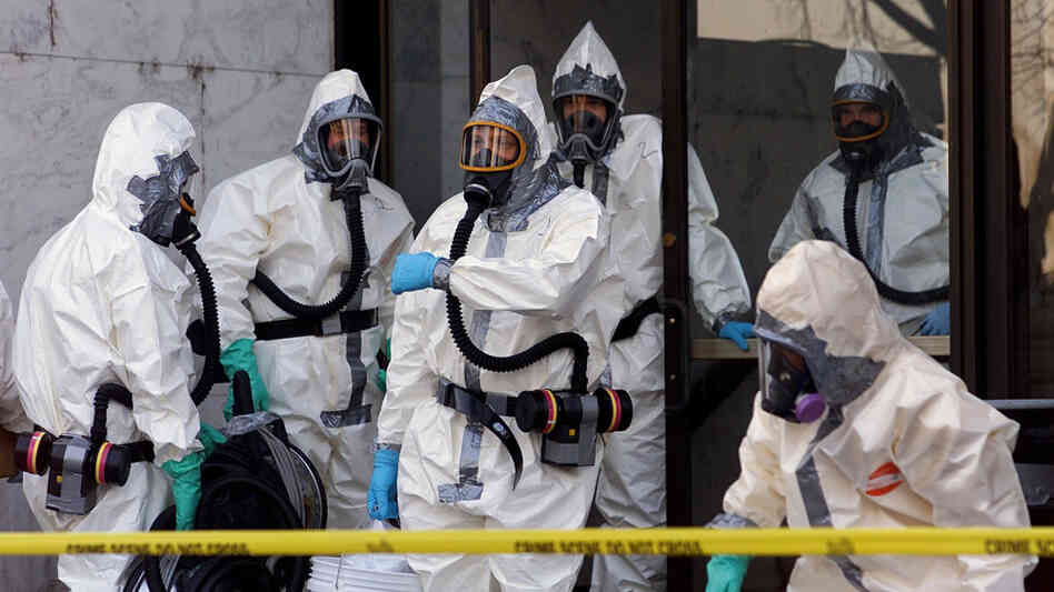 Hazardous materials experts enter the Hart Building of the U.S. Senate on Nov. 7, 2001, in Washington. The building was closed after an anthrax-laced letter was found in then-Sen. Tom Daschle's office. Hazardous materials experts enter the Hart Building of the U.S. Senate on Nov. 7, 2001, in Washington. The building was closed after an anthrax-laced letter was found in then-Sen. Tom Daschle's office.