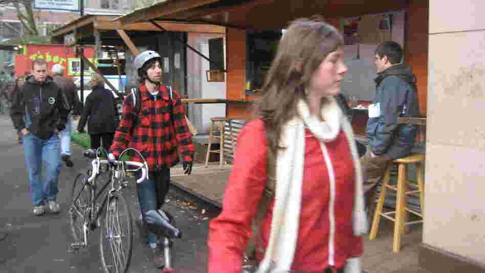 Economists say unemployment is high in Portland and wages are low. But the city is still attracting young, white professionals from the Northeast and Midwest.