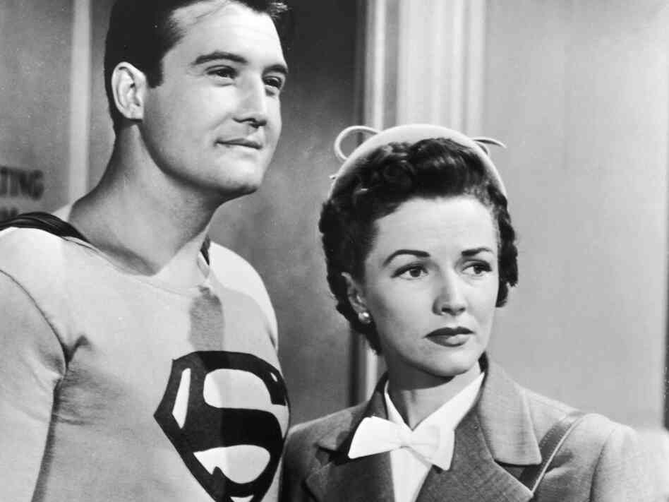 American actor George Reeves as Superman stands with Phyllis Coates, as Lois Lane, in a still from the television series 'Adventures of Superman,' circa 1952.