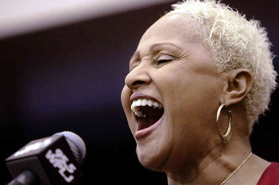 Love performs at a radio benefit in 2004 after her 80s comeback. Of the hundreds of recordings Love made in early years, the few credited to her name include "(Today I Met) The Boy I'm Gonna Marry" and "Wait Til My Bobby Gets Home." 