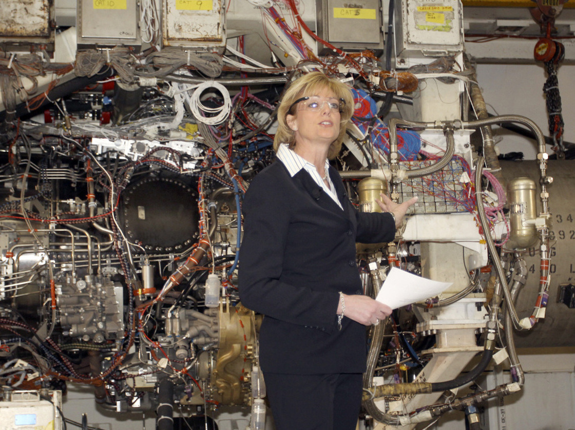 GE Aviation's former president, Jean Lyndon-Rodgers, in 2009, showing off the joint strike fighter engine in Evendale, Ohio.