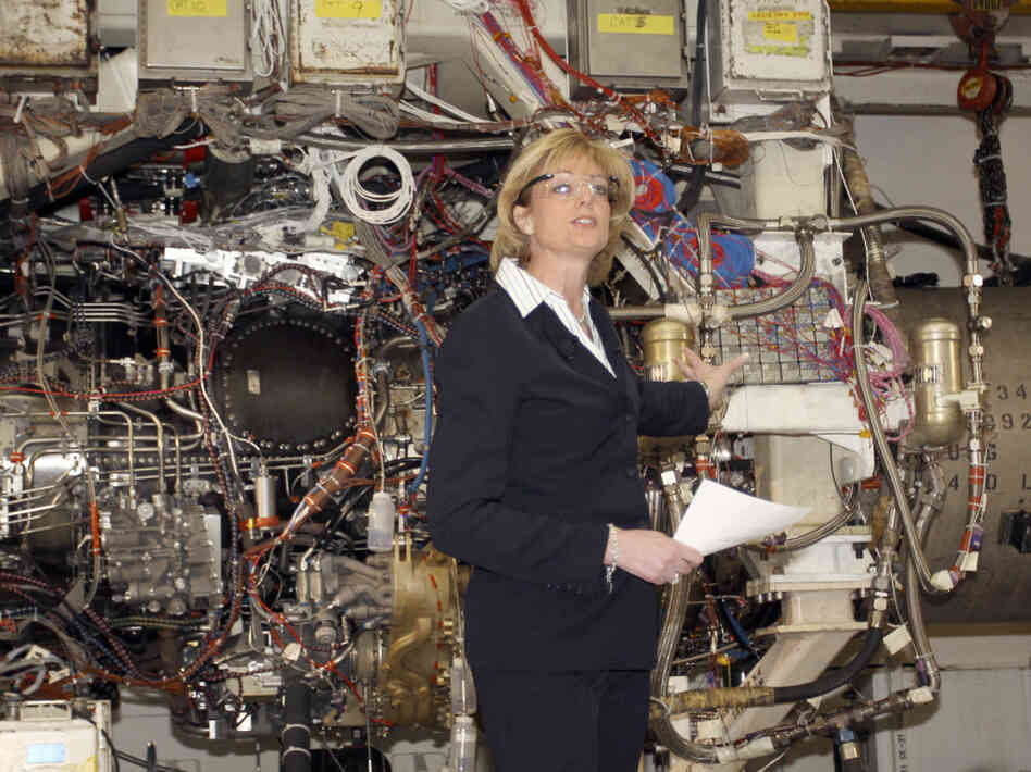 GE Aviation's former president, Jean Lyndon-Rodgers, in 2009, showing off the joint strike fighter engine in Evendale, Ohio.