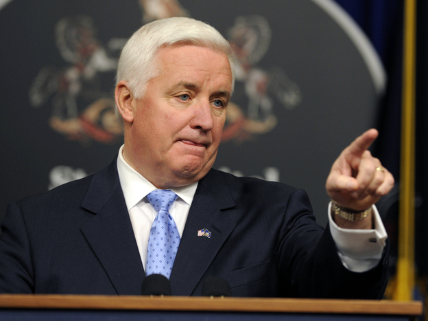 Pennsylvania Gov. Tom Corbett fields media questions during a news conference on Tuesday in Harrisburg.  He said he's removing a number of state employees as a result of an investigation into a Philadelphia clinic where abortions were performed.