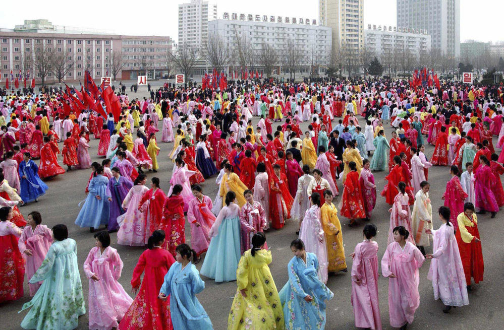 North Korean students dance to celebrate the 69th birthday of their leader, Kim Jong Il, in the North Korean capital of Pyongyang.