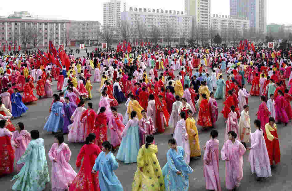 North Korean students dance to celebrate the 69th birthday of their leader, Kim Jong Il, in the North Korean capital of Pyongyang.