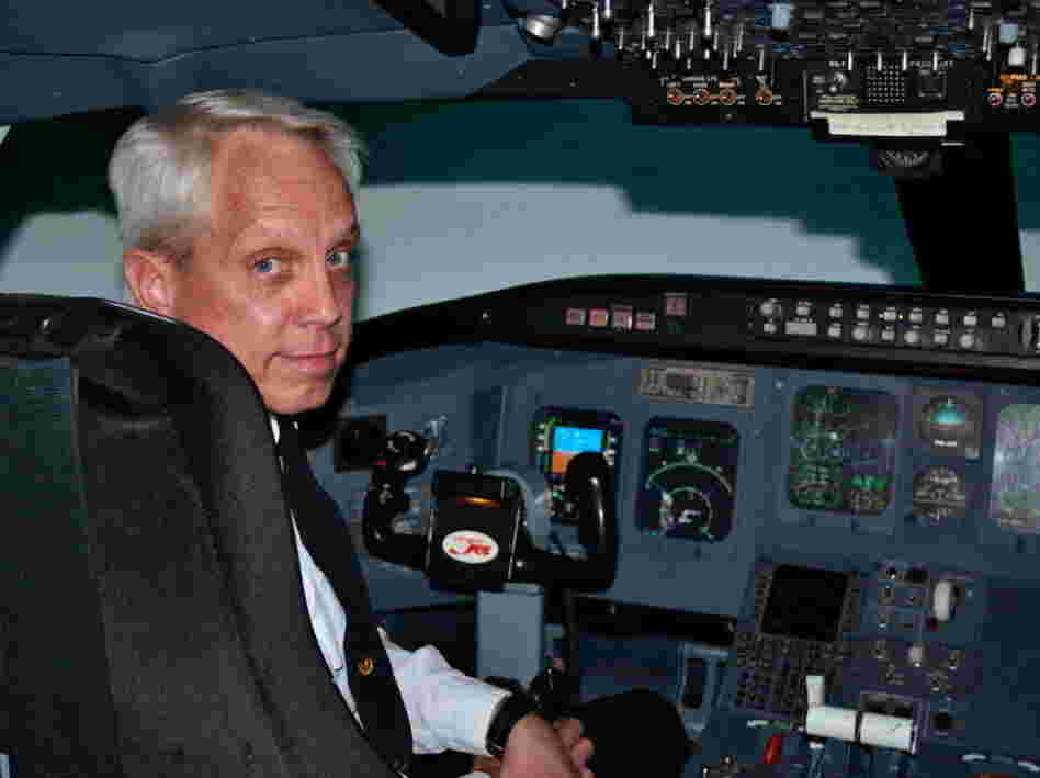 Flight instructor Tom Peterson uses a simulated Canadair Regional Jet  flight deck at Embry-Riddle Aeronautical University to teach pilots how to fly a modern aircraft, which relies heavily on computer automation.