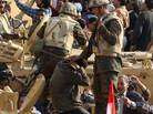 Egyptian soldiers detained this anti-government demonstrator in Cairo's Tahrir square on Feb. 2, 2011. Egyptian soldiers detained this anti-government demonstrator in Cairo's Tahrir square on Feb. 2, 2011.