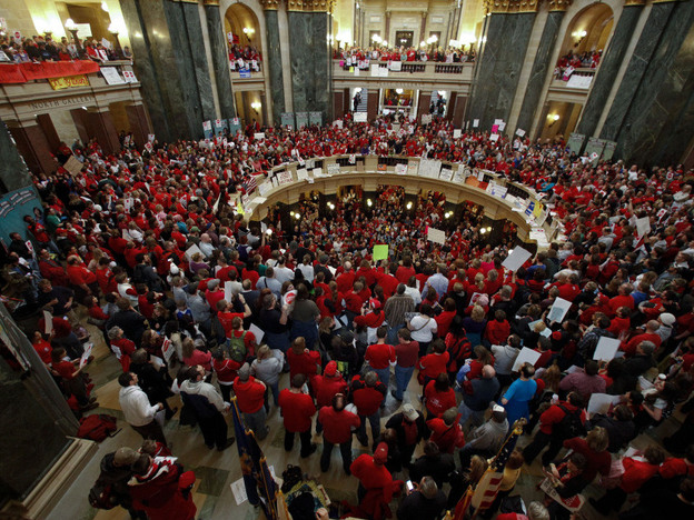 Protesters fill the Wisconsin Capitol in Madison on Thursday to protest Gov. Scott Walker's bill to eliminate collective bargaining rights for many state workers.