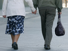 An elderly couple holds hands while walking along a Berlin street. A recent study showed that walking grows the region of the brain that archives memories. An elderly couple holds hands while walking along a Berlin street. A recent study showed that walking grows the region of the brain that archives memories.