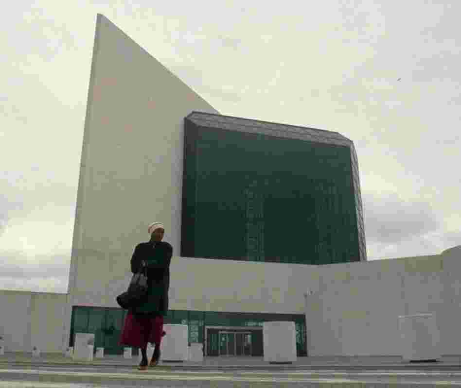 A worker at the John F. Kennedy Library and Museum in Boston leaves after being ordered out due to a 1995 government shutdown.