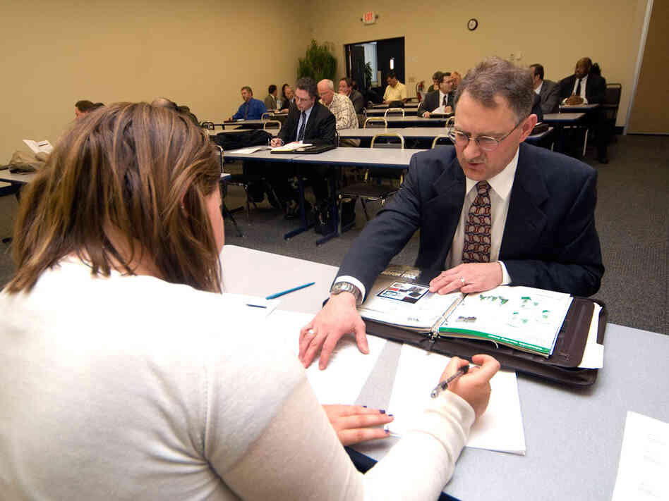 Alfred Schiazza, an engineer with 33 years of work experience, is interviewed by Nicole Chmielewski, a recruiter at an Employment Connections office in Parma, Ohio. Alfred Schiazza, an engineer with 33 years of work experience, is interviewed by Nicole Chmielewski, a recruiter at an Employment Connections office in Parma, Ohio.