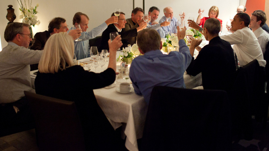 President Obama joins in a toast with Technology Business Leaders at a dinner in Woodside, California, Feb. 17, 2011. Apple's Steve Jobs is to the president's left. Facebook's Mark Zuckerberg is to the president's right.