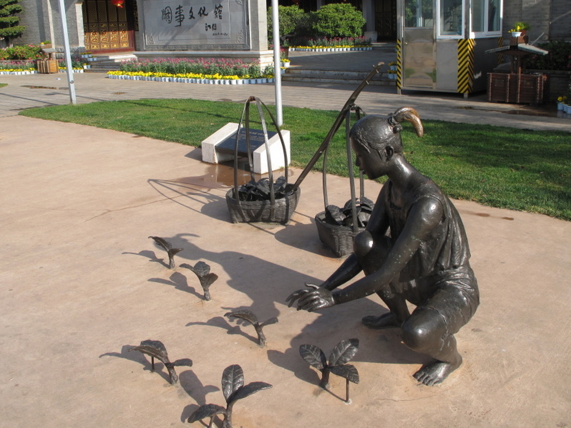 Bronze statues of tobacco farmers outside Yuxi's Tobacco Culture Museum.  The exhibits don't include any warnings of the dangers of  smoking.
