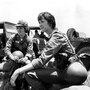 U.S. Army nurses rest on  sandbags at Cam Ranh Bay in South  Vietnam, July 1965.