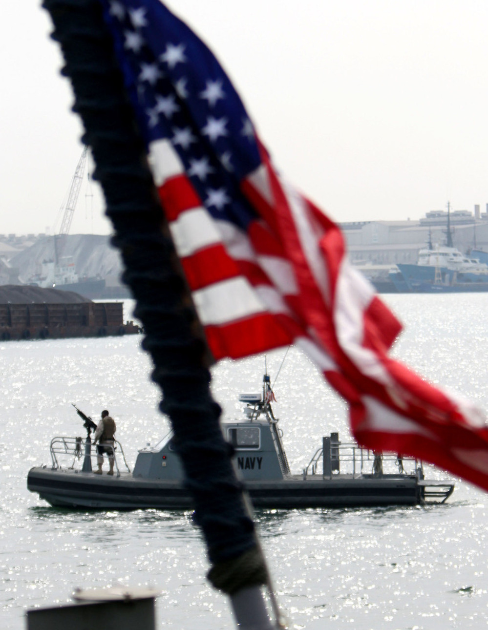 A U.S. Navy boat patrols the harbor of Manama, Bahrain, last year.