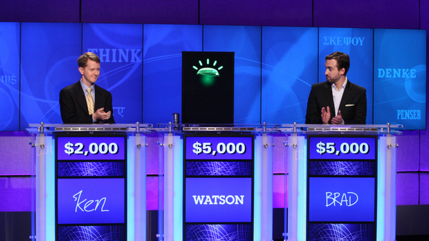 Jeopardy contestants Ken Jennings (left), Brad Rutter and a computer named Watson.