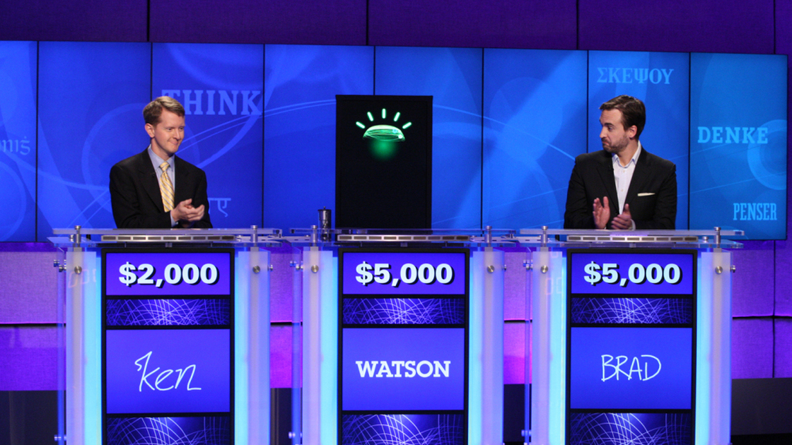 Jeopardy contestants Ken Jennings (left), Brad Rutter and a computer named Watson.