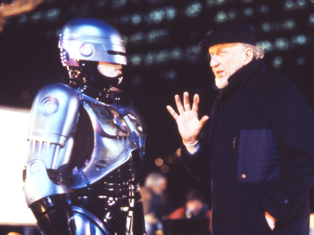 Film director Irvin Kershner (right) and actor Peter Weller talk on the set of "Robocop II."