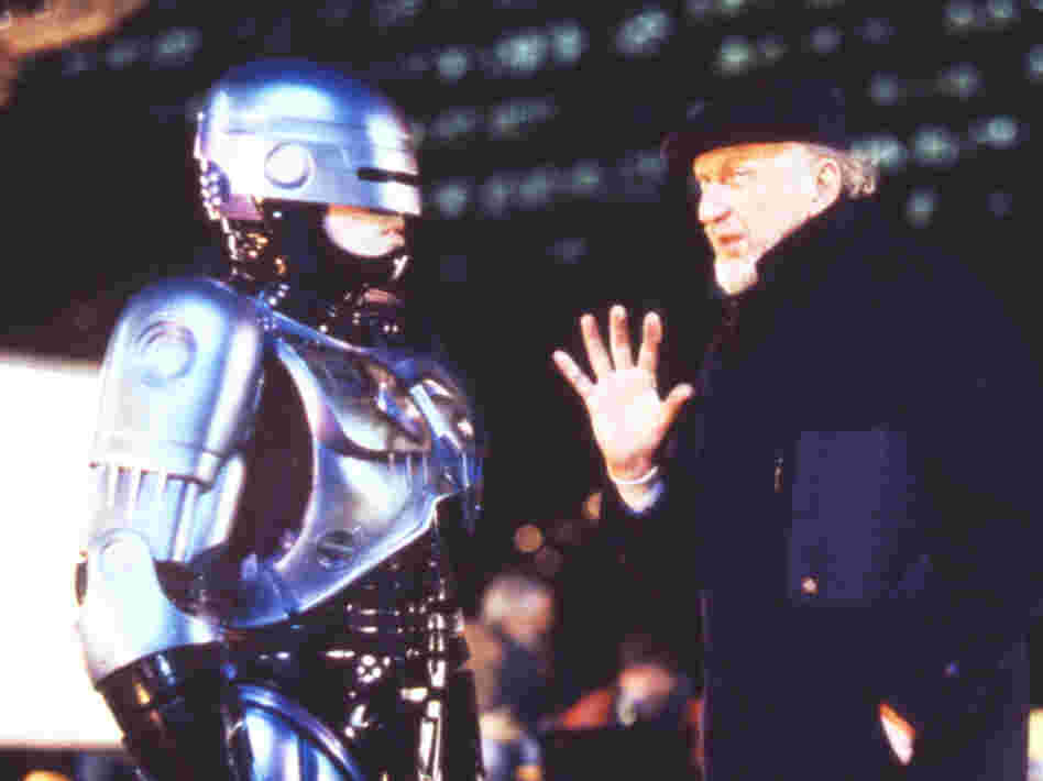Film director Irvin Kershner (right) and actor Peter Weller talk on the set of "Robocop II."