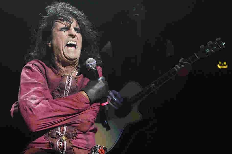 By the turn of the 21st century, Cooper was a household name and rock legend as he continued to tour and release albums. He is pictured performing his "Halloween Night of Fear" show at The Roundhouse in North London in 2010. 