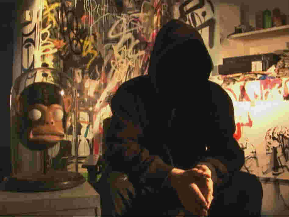 Throughout the film, British street artist Banksy's face is obscured, and his voice is altered to prevent identification. Throughout the film, British street artist Banksy's face is obscured, and his voice is altered to prevent identification.